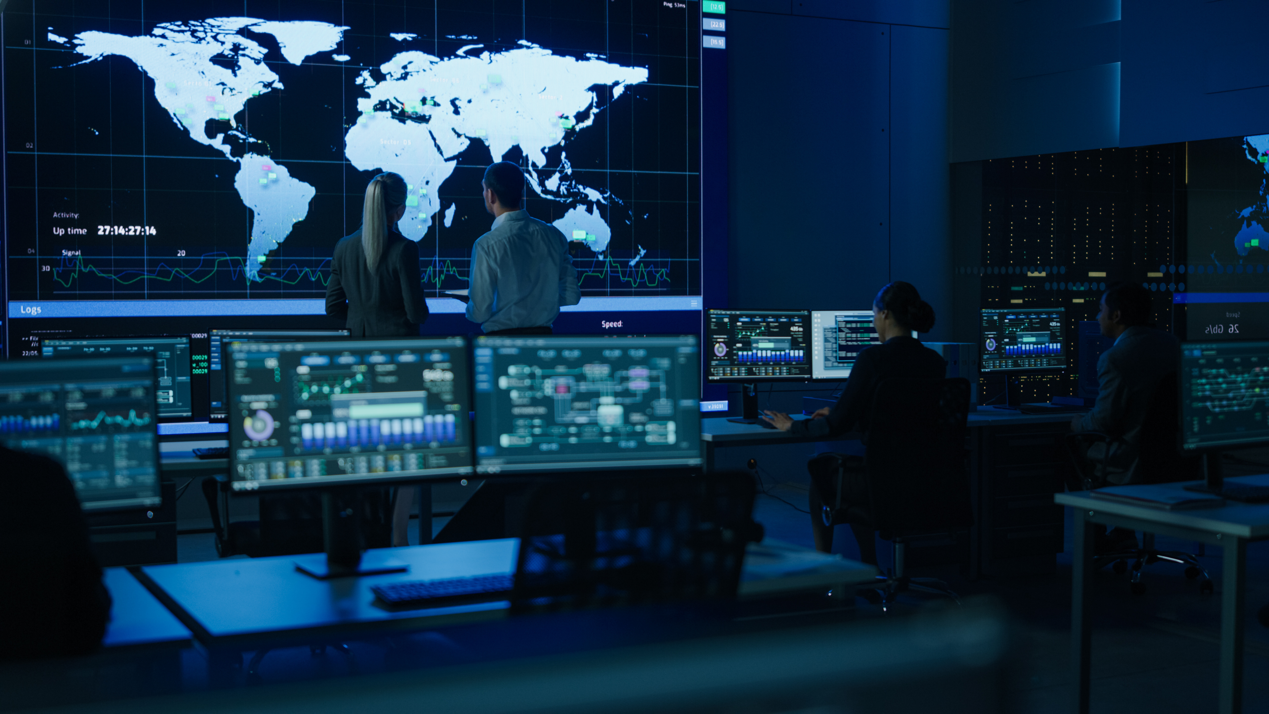 Mission operations center with global monitoring displays